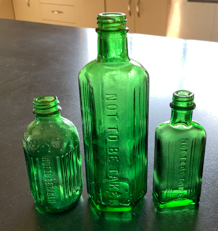 Three vintage Glass Poison bottles